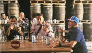 Visitors exploring exhibits at the Dominican Rum Museum in San Pedro de Macorís