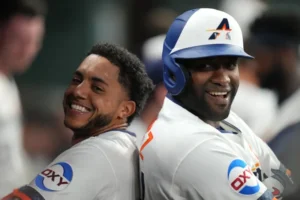 Jeremy Peña celebrates after hitting a grand slam for the Houston Astros