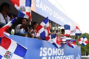 Dominican athletes and fans celebrate after Santo Domingo 2026