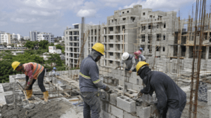 Dominican construction workers building apartments in Santo Domingo