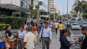 Workers, commuters, street vendors and businesses in a busy Santo Domingo commercial district, illustrating the interconnected Dominican economy