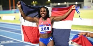 Dominican Republic athletes celebrate medals at the Central American and Caribbean Games