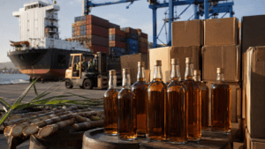 Dominican rum bottles and export cargo at a Dominican port, representing the country’s international rum trade