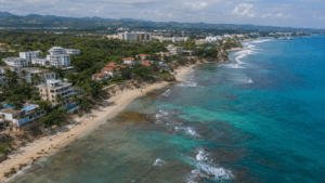 A coastal landscape in the Dominican Republic illustrating the effects of climate change, including beach erosion and stronger tropical weather.