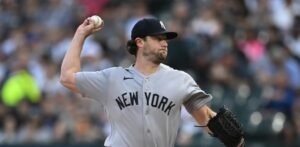 Gerrit Cole pitching for the New York Yankees against the Atlanta Braves