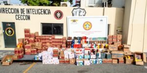 Authorities inspect seized illegal merchandise in Villa Consuelo Santo Domingo