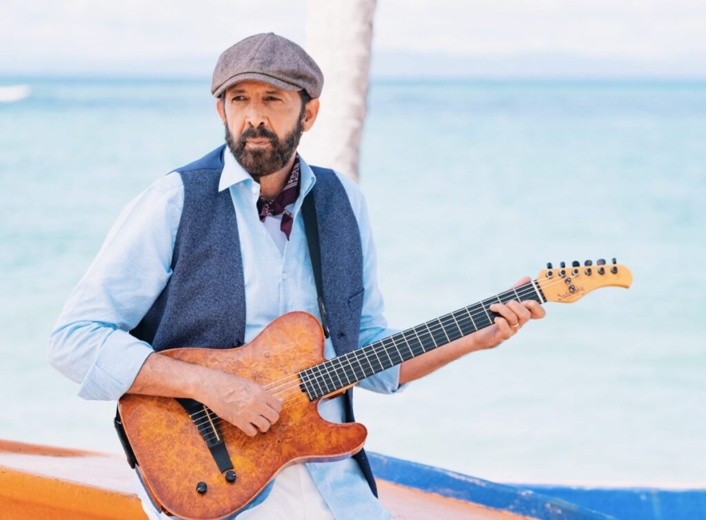 Juan Luis Guerra performing at Santo Domingo 2026 closing ceremony