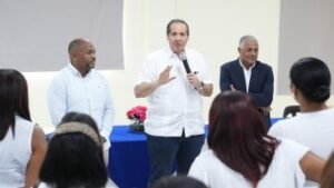 Public health officials reviewing malaria prevention efforts in Azua