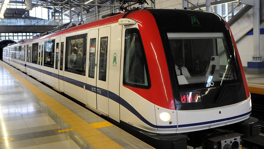 Santo Domingo Metro train arriving at a modern underground station