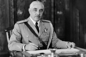Historical black-and-white portrait of Dominican dictator Rafael Leónidas Trujillo in military uniform