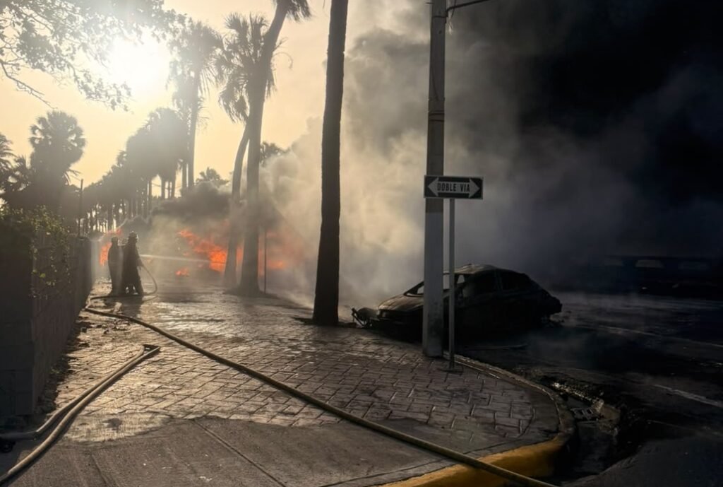Firefighters respond to a tanker fire along Santo Domingo's Malecón