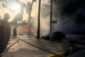 Firefighters respond to a tanker fire along Santo Domingo's Malecón