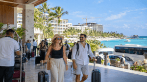 Dominican Republic tourism expansion with international visitors arriving at a modern beachfront resort
