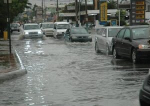 Rainy weather and storm clouds over Santo Domingo during a weather alert