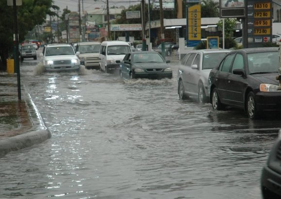 Rainy weather and storm clouds over Santo Domingo during a weather alert