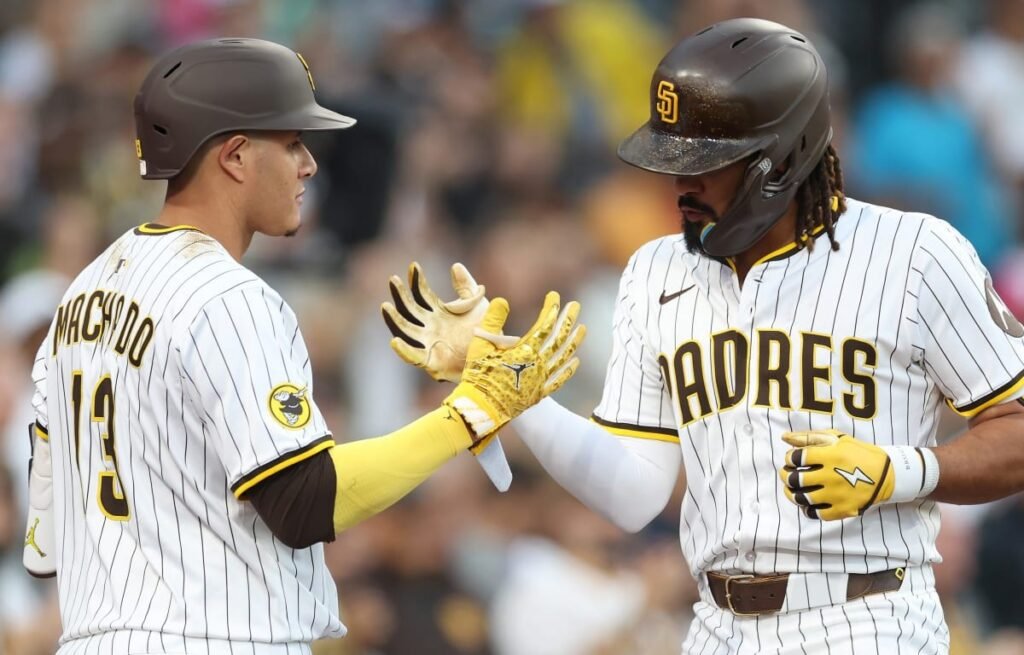 Fernando Tatis Jr. and Manny Machado during a Padres game at Petco Park