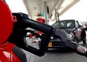 Mechanic inspecting a vehicle fuel system in the Dominican Republic