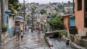 Informal settlement in Greater Santo Domingo with densely packed homes, narrow streets and limited drainage after heavy rainfall