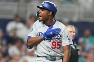 Josué de Paula celebrates his first Major League Baseball home run