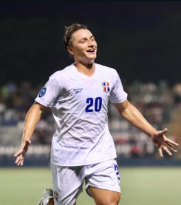 Lucas Bretón celebrates the Dominican Republic's comeback against Nicaragua