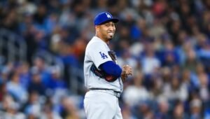 Edwin Díaz pitching for the Los Angeles Dodgers in a postseason game